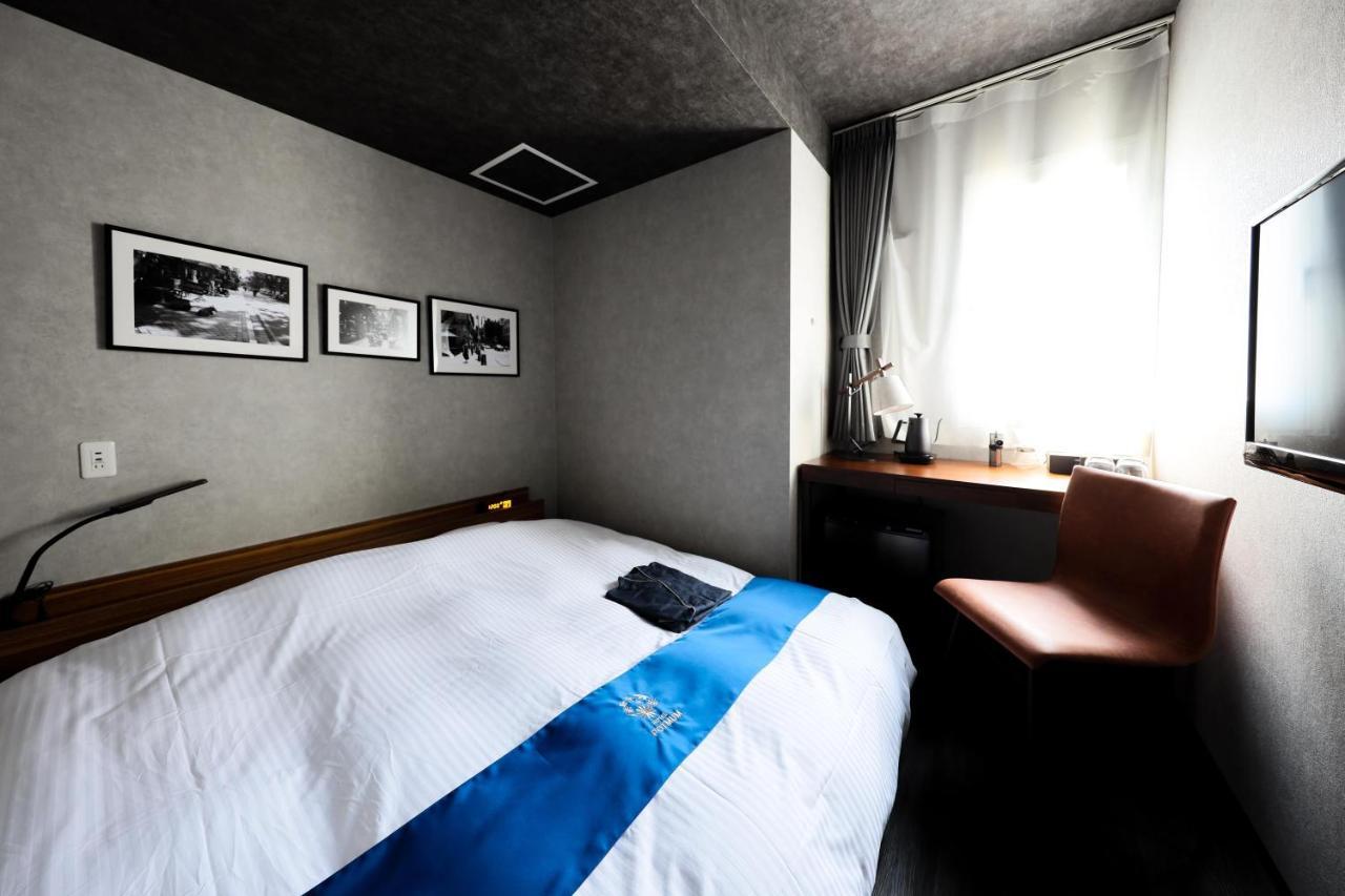 Hotel Potmum Sapporo Esterno foto